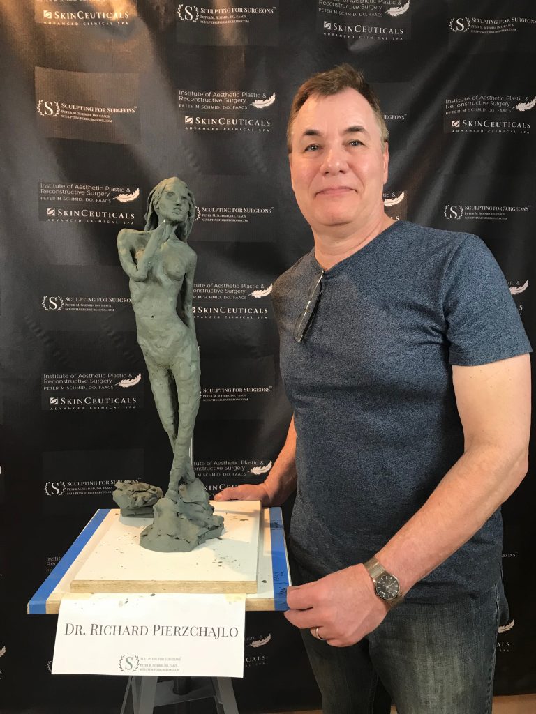 Dr. P with his sculpture